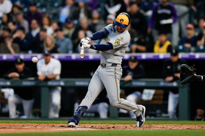 Apr 9, 2025; Denver, Colorado, USA; Milwaukee Brewers second baseman Brice Turang (2) hits an RBI single and reaches second on a throwing error in the third inning against the Colorado Rockies at Coors Field. Mandatory Credit: Isaiah J. Downing-Imagn Images