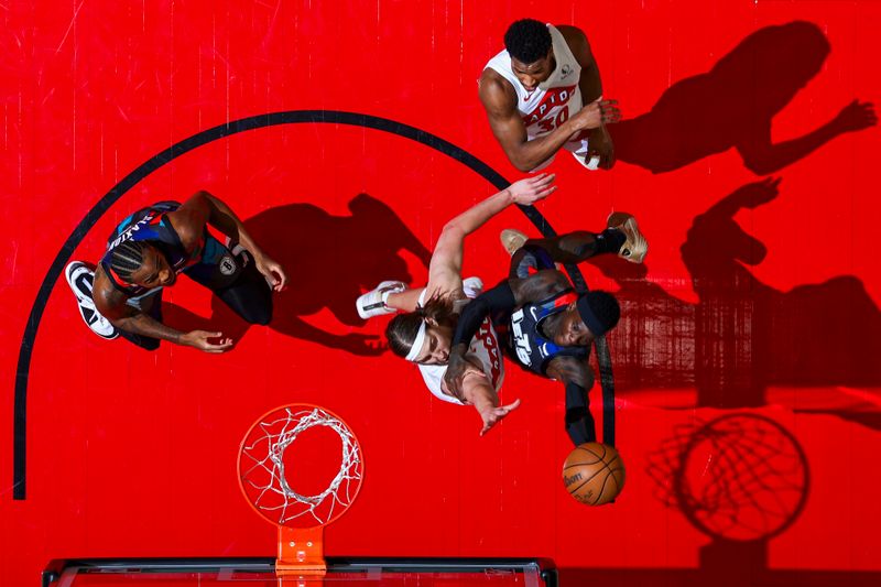 TORONTO, CANADA - MARCH 25: Dennis Schroder #17 of the Brooklyn Nets drives to the basket during the game against the Toronto Raptors on March 25, 2024 at the Scotiabank Arena in Toronto, Ontario, Canada.  NOTE TO USER: User expressly acknowledges and agrees that, by downloading and or using this Photograph, user is consenting to the terms and conditions of the Getty Images License Agreement.  Mandatory Copyright Notice: Copyright 2024 NBAE (Photo by Vaughn Ridley/NBAE via Getty Images)