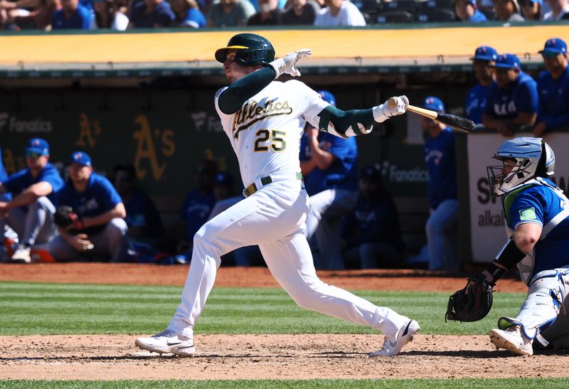 Sep 4, 2023; Oakland, California, USA; Oakland Athletics designated hitter Brett Rooker (25) hits a single against the Toronto Blue Jays during the ninth inning at Oakland-Alameda County Coliseum. Mandatory Credit: Kelley L Cox-USA TODAY Sports