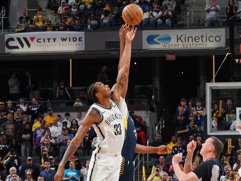 INDIANAPOLIS, IN - APRIL 1: The opening tip off during the game between the Brooklyn Nets and the Indiana Pacers on April 1, 2024 at Gainbridge Fieldhouse in Indianapolis, Indiana. NOTE TO USER: User expressly acknowledges and agrees that, by downloading and or using this Photograph, user is consenting to the terms and conditions of the Getty Images License Agreement. Mandatory Copyright Notice: Copyright 2024 NBAE (Photo by Ron Hoskins/NBAE via Getty Images)