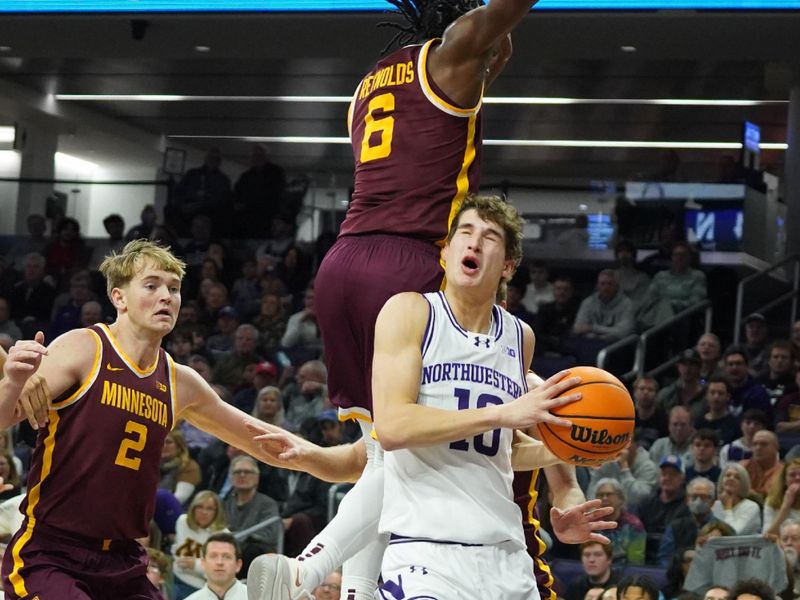 Jan 3, 2026; Evanston, Illinois, USA; Northwestern Wildcats guard Max Green (10) scores as Minnesota Golden Gophers guard Langston Reynolds (6) defends him during the first half at Welsh-Ryan Arena. Mandatory Credit: David Banks-Imagn Images