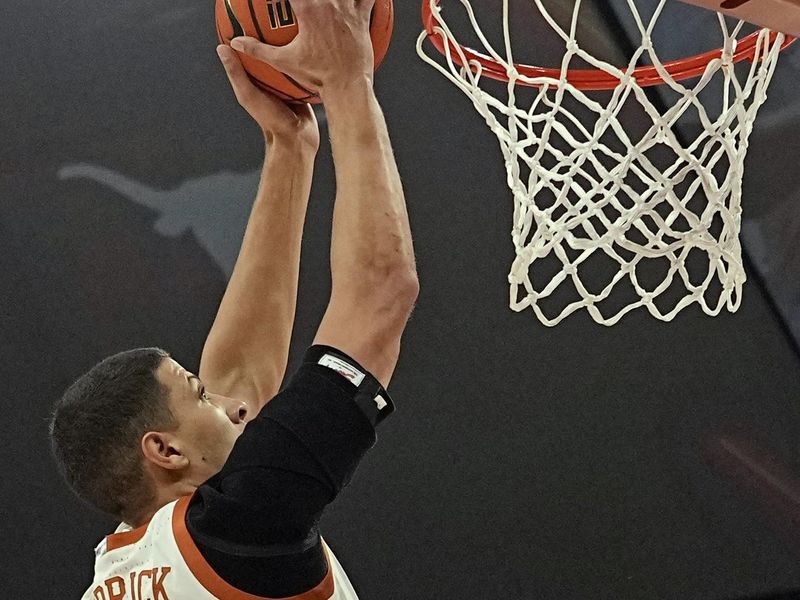 Dec 9, 2023; Austin, Texas, USA; Texas Longhorns forward Kadin Shedrick (5) dunks during the first half against the Houston Christian Huskies at Moody Center. Mandatory Credit: Scott Wachter-USA TODAY Sports