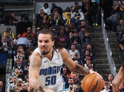INDIANAPOLIS, IN - DECEMBER 23:  Cole Anthony #50 of the Orlando Magic handles the ball during the game against the Indiana Pacers on December 23, 2023 at Gainbridge Fieldhouse in Indianapolis, Indiana. NOTE TO USER: User expressly acknowledges and agrees that, by downloading and or using this Photograph, user is consenting to the terms and conditions of the Getty Images License Agreement. Mandatory Copyright Notice: Copyright 2023 NBAE (Photo by Ron Hoskins/NBAE via Getty Images)