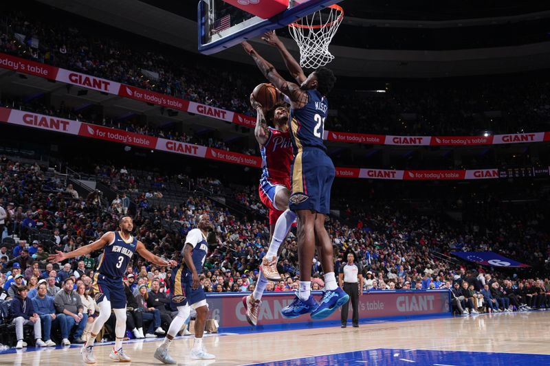 PHILADELPHIA, PA - JANUARY 10: Yves Missi #21 of the New Orleans Pelicans blocks the basket during the game against the Philadelphia 76ers on January 10, 2025 at the Wells Fargo Center in Philadelphia, Pennsylvania NOTE TO USER: User expressly acknowledges and agrees that, by downloading and/or using this Photograph, user is consenting to the terms and conditions of the Getty Images License Agreement. Mandatory Copyright Notice: Copyright 2025 NBAE (Photo by Jesse D. Garrabrant/NBAE via Getty Images)