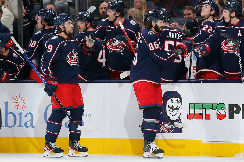 Nov 22, 2023; Columbus, Ohio, USA; Columbus Blue Jackets right wing Kirill Marchenko (86) celebrates his goal against the Chicago Blackhawks during the second period at Nationwide Arena. Mandatory Credit: Russell LaBounty-USA TODAY Sports