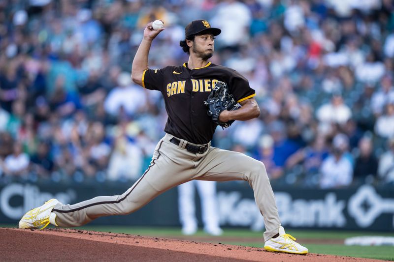 Aug 9, 2023; Seattle, Washington, USA; San Diego Padres starter Yu Darvish (11) delivers a pitch during the first inning at T-Mobile Park. Mandatory Credit: Stephen Brashear-USA TODAY Sports