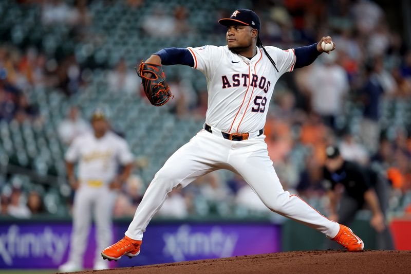 Sep 12, 2024; Houston, Texas, USA; Houston Astros starting pitcher Framber Valdez (59) delivers a pitch against the Oakland Athletics during the first inning at Minute Maid Park. Mandatory Credit: Erik Williams-Imagn Images