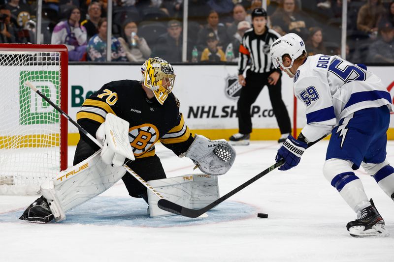 Oct 13, 2025; Boston, Massachusetts, USA; Tampa Bay Lightning center Jake Guentzel (59) looks for a rebound in front of Boston Bruins goaltender Joonas Korpisalo (70) during the first period at TD Garden. Mandatory Credit: Winslow Townson-Imagn Images