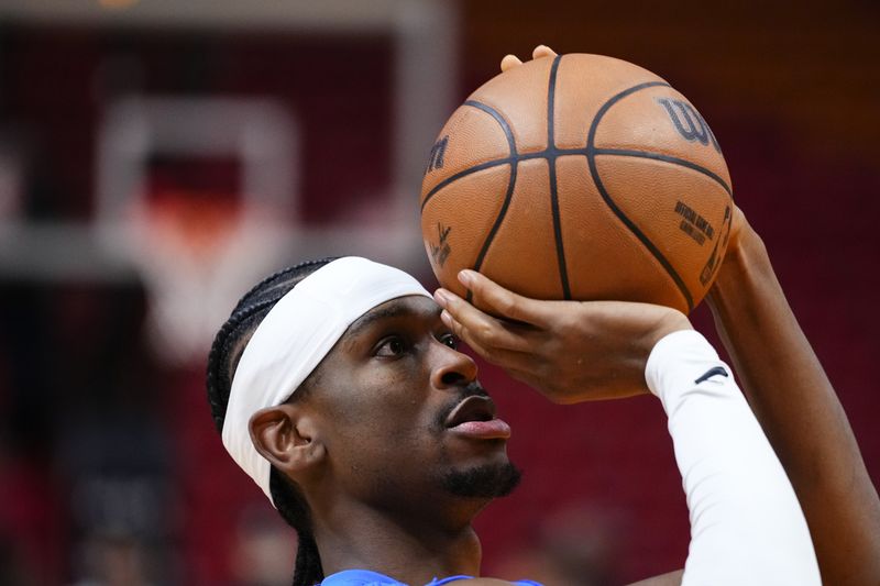 MIAMI, FLORIDA - JANUARY 10: Shai Gilgeous-Alexander #2 of the Oklahoma City Thunder warms up prior to a game against the Miami Heat at Kaseya Center on January 10, 2024 in Miami, Florida. NOTE TO USER: User expressly acknowledges and agrees that, by downloading and or using this photograph, User is consenting to the terms and conditions of the Getty Images License Agreement. (Photo by Rich Storry/Getty Images)