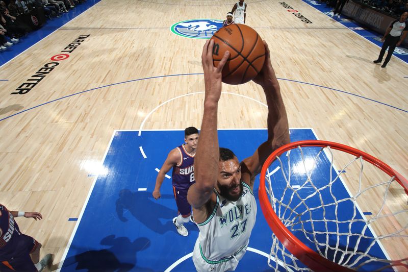 MINNEAPOLIS, MN -  APRIL 20: Rudy Gobert #27 of the Minnesota Timberwolves dunks the ball during Round One Game One of the 2024 NBA Playoffs against the Phoenix Suns on April 20, 2024 at Target Center in Minneapolis, Minnesota. NOTE TO USER: User expressly acknowledges and agrees that, by downloading and or using this Photograph, user is consenting to the terms and conditions of the Getty Images License Agreement. Mandatory Copyright Notice: Copyright 2024 NBAE (Photo by Jordan Johnson/NBAE via Getty Images)