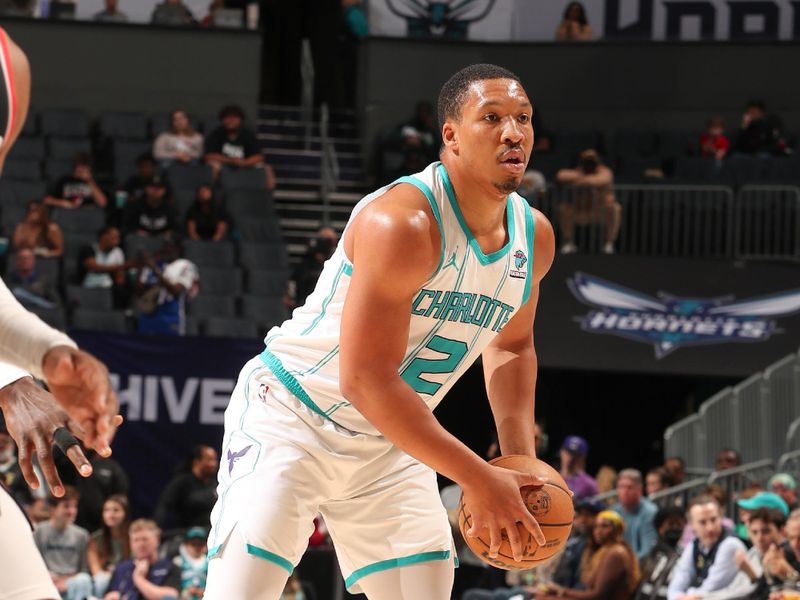 CHARLOTTE, NC - APRIL 3: Grant Williams #2 of the Charlotte Hornets handles the ball during the game  on April 3, 2024 at Spectrum Center in Charlotte, North Carolina. NOTE TO USER: User expressly acknowledges and agrees that, by downloading and or using this photograph, User is consenting to the terms and conditions of the Getty Images License Agreement. Mandatory Copyright Notice: Copyright 2024 NBAE (Photo by Kent Smith/NBAE via Getty Images)