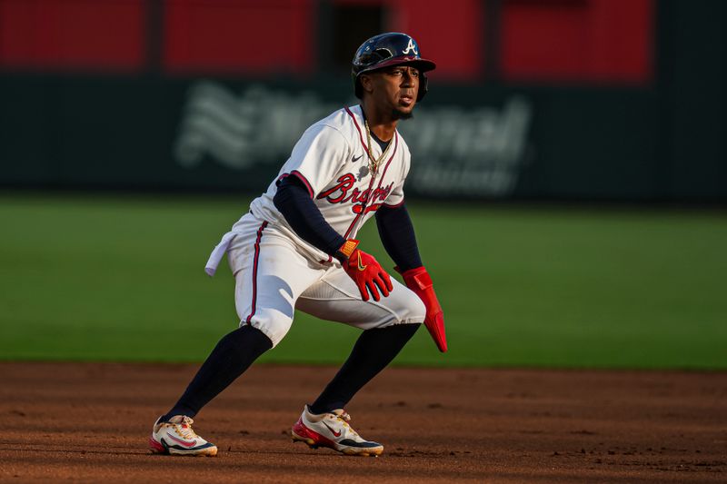 May 29, 2024; Cumberland, Georgia, USA; Atlanta Braves second baseman Ozzie Albies (1) leads off of second base against the Washington Nationals during the first inning at Truist Park. Mandatory Credit: Dale Zanine-USA TODAY Sports