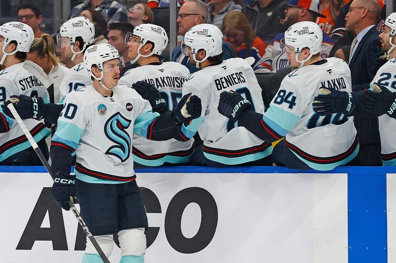 Jan 27, 2025; Edmonton, Alberta, CAN; Seattle Kraken celebrate a goal scored by forward Eeli Tolvannen (20) during the first period against the Edmonton Oilers at Rogers Place. Mandatory Credit: Perry Nelson-Imagn Images