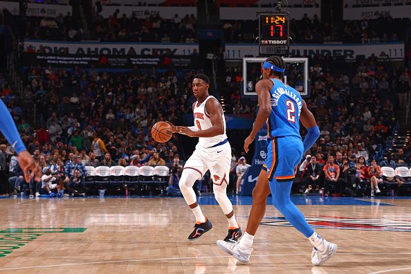 OKLAHOMA CITY, OK - DECEMBER 27: RJ Barrett #9 of the New York Knicks dribbles the ball during the game against the Oklahoma City Thunder on December 27, 2023 at Paycom Arena in Oklahoma City, Oklahoma. NOTE TO USER: User expressly acknowledges and agrees that, by downloading and or using this photograph, User is consenting to the terms and conditions of the Getty Images License Agreement. Mandatory Copyright Notice: Copyright 2023 NBAE (Photo by Zach Beeker/NBAE via Getty Images)