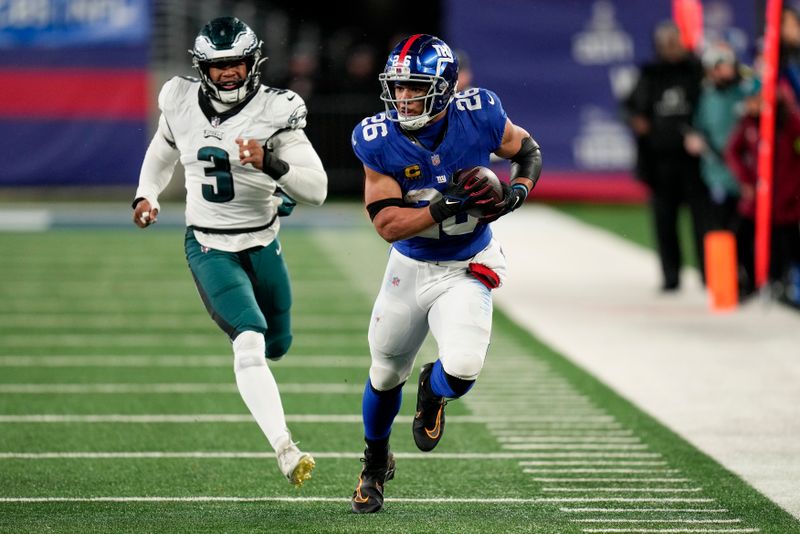 New York Giants running back Saquon Barkley (26) carries the ball against the Philadelphia Eagles during the second quarter of an NFL football game, Sunday, Jan. 7, 2024, in East Rutherford, N.J. (AP Photo/Seth Wenig)