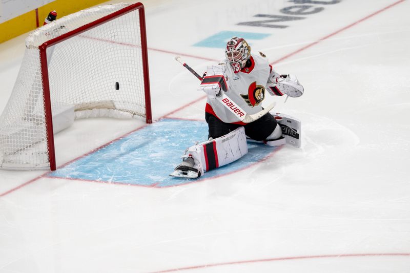 Nov 27, 2024; San Jose, California, USA; Ottawa Senators goaltender Linus Ullmark (35) watches as the puck bounces off the top of the net against the San Jose Sharks during the second period at SAP Center at San Jose. Mandatory Credit: Neville E. Guard-Imagn Images