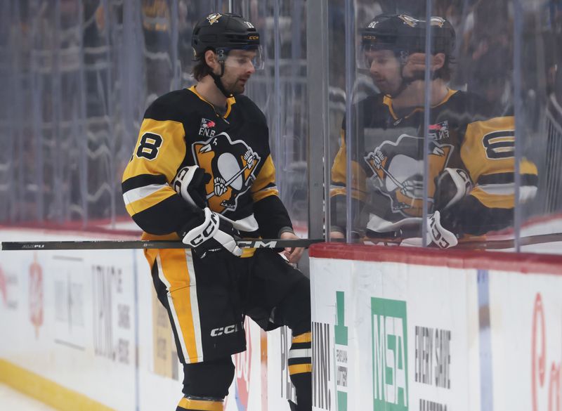 Oct 27, 2025; Pittsburgh, Pennsylvania, USA;  Pittsburgh Penguins center Tommy Novak (18) steps into the penalty box on a hooking penalty against the St. Louis Blues during the first period at PPG Paints Arena. Mandatory Credit: Charles LeClaire-Imagn Images