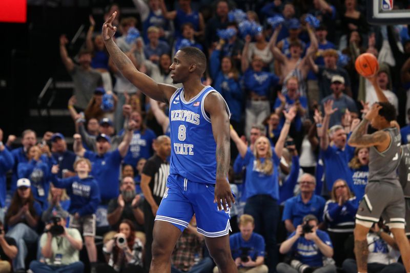 Mar 3, 2024; Memphis, Tennessee, USA; Memphis Tigers forward David Jones (8) reacts after a three point basket during the second half against the UAB Blazers at FedExForum. Mandatory Credit: Petre Thomas-USA TODAY Sports