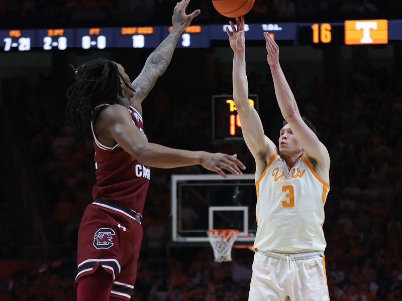 Jan 30, 2024; Knoxville, Tennessee, USA; Tennessee Volunteers guard Dalton Knecht (3) shoots the ball against the South Carolina Gamecocks during the first half at Thompson-Boling Arena at Food City Center. Mandatory Credit: Randy Sartin-USA TODAY Sports