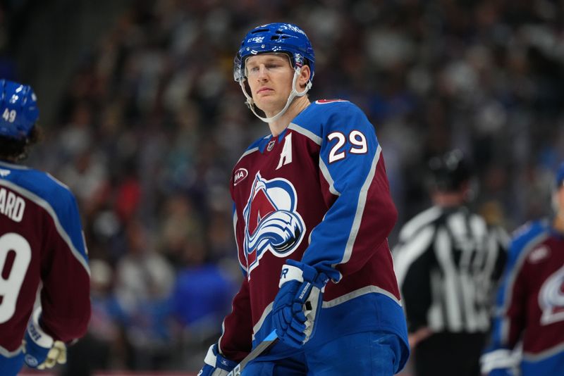 Dec 2, 2025; Denver, Colorado, USA; Colorado Avalanche center Nathan MacKinnon (29) during  the second period against the Vancouver Canucks at Ball Arena. Mandatory Credit: Ron Chenoy-Imagn Images