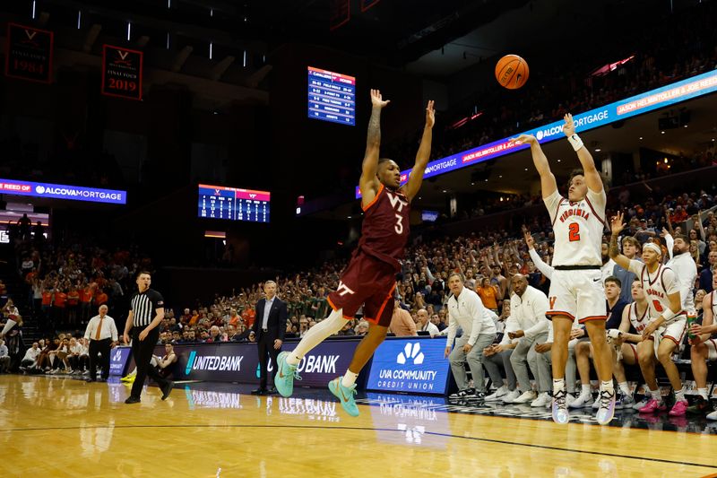 Mar 7, 2026; Charlottesville, Virginia, USA; Virginia Cavaliers guard Chance Mallory (2) shoots the ball as Virginia Tech Hokies guard Ben Hammond (3) defends in the second half at John Paul Jones Arena. Mandatory Credit: Geoff Burke-Imagn Images