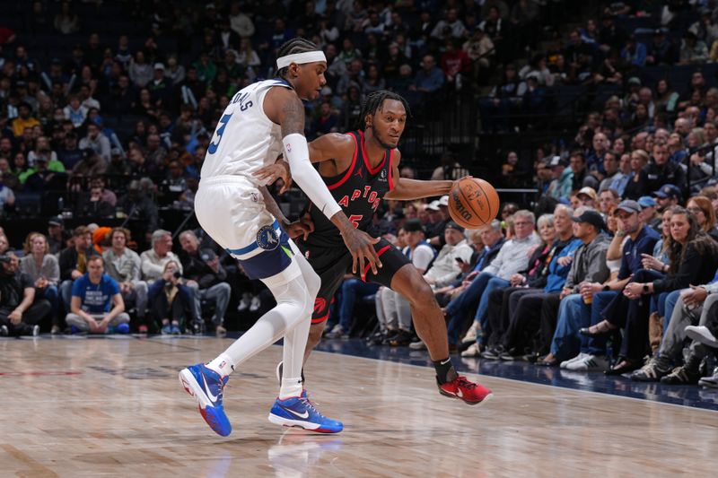 MINNEAPOLIS, MN -  APRIL 3: Immanuel Quickley #5 of the Toronto Raptors dribbles the ball during the game against the Minnesota Timberwolves on April 3, 2024 at Target Center in Minneapolis, Minnesota. NOTE TO USER: User expressly acknowledges and agrees that, by downloading and or using this Photograph, user is consenting to the terms and conditions of the Getty Images License Agreement. Mandatory Copyright Notice: Copyright 2024 NBAE (Photo by Jordan Johnson/NBAE via Getty Images)