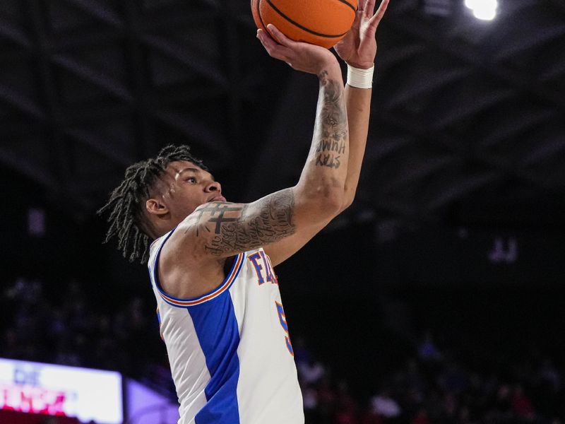 Feb 28, 2023; Athens, Georgia, USA; Florida Gators guard Will Richard (5) shoots against the Georgia Bulldogs during the first half at Stegeman Coliseum. Mandatory Credit: Dale Zanine-USA TODAY Sports