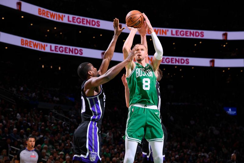 BOSTON, MA - APRIL 5:  Kristaps Porzingis #8 of the Boston Celtics shoots the ball during the game against the Sacramento Kings on April 5, 2024 at the TD Garden in Boston, Massachusetts. NOTE TO USER: User expressly acknowledges and agrees that, by downloading and or using this photograph, User is consenting to the terms and conditions of the Getty Images License Agreement. Mandatory Copyright Notice: Copyright 2024 NBAE  (Photo by Brian Babineau/NBAE via Getty Images)