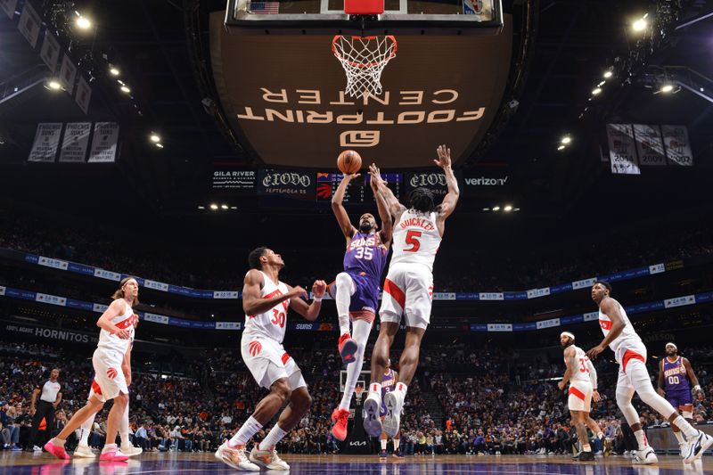 PHOENIX, AZ - MARCH 7: Kevin Durant #35 of the Phoenix Suns shoots the ball during the game against the Toronto Raptors on March 7, 2024 at Footprint Center in Phoenix, Arizona. NOTE TO USER: User expressly acknowledges and agrees that, by downloading and or using this photograph, user is consenting to the terms and conditions of the Getty Images License Agreement. Mandatory Copyright Notice: Copyright 2024 NBAE (Photo by Barry Gossage/NBAE via Getty Images)