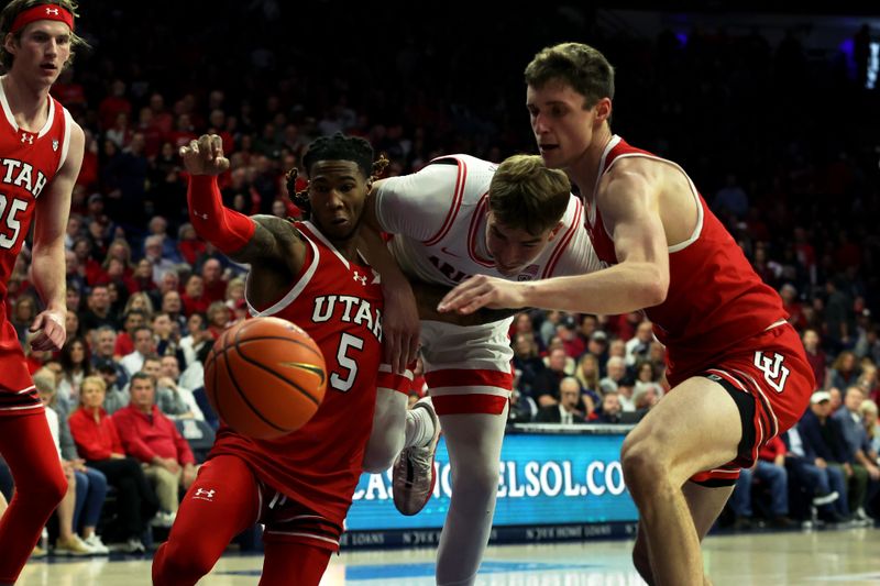 Jan 6, 2024; Tucson, Arizona, USA; Utah Utes guard Deivon Smith (5) runs for a loose ball against Arizona Wildcats center Motiejus Krivas (14) during the second half at McKale Center. Mandatory Credit: Zachary BonDurant-USA TODAY Sports