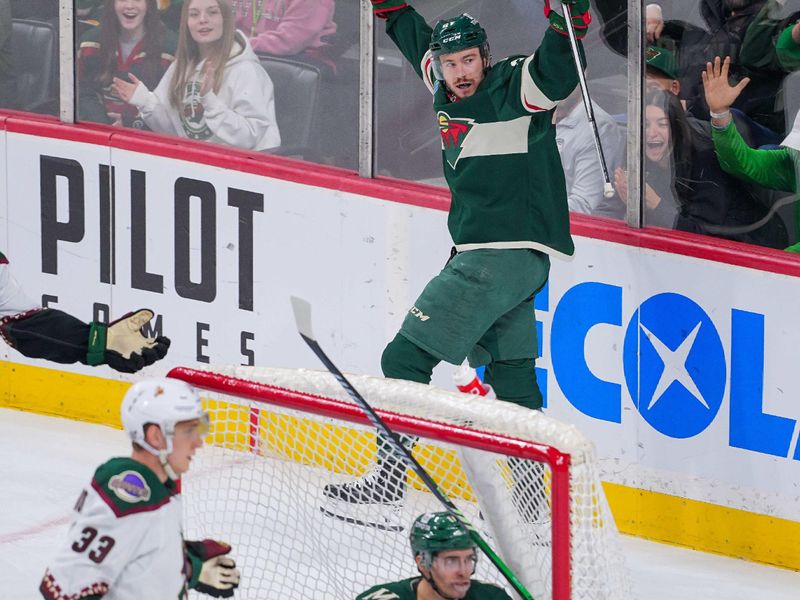 Mar 12, 2024; Saint Paul, Minnesota, USA; Minnesota Wild center Jacob Lucchini (27) has a goal disallowed for goalie interference against the Arizona Coyotes in the third period at Xcel Energy Center. Mandatory Credit: Brad Rempel-USA TODAY Sports