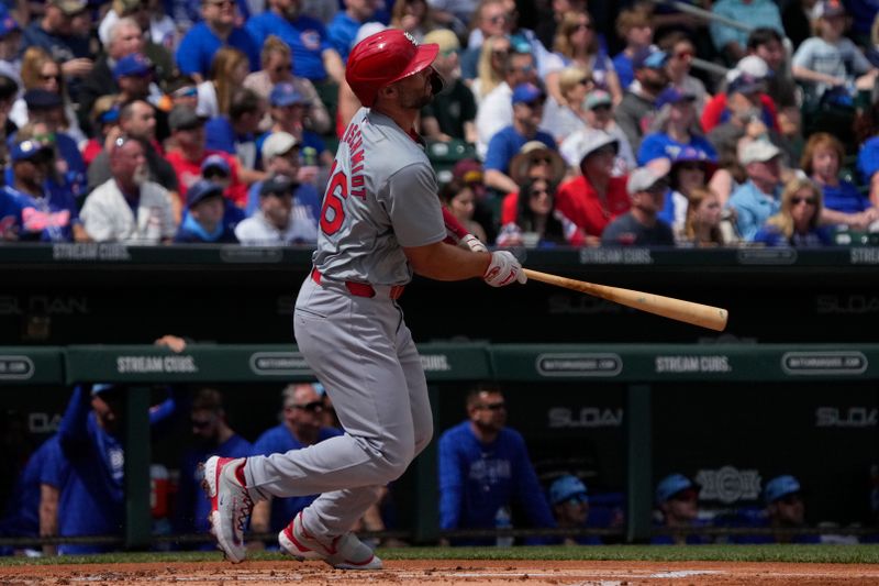 Mar 26, 2024; Mesa, Arizona, USA; St. Louis Cardinals first baseman Paul Goldschmidt (46) hits a double against the Chicago Cubs in the first inning at Sloan Park. Mandatory Credit: Rick Scuteri-USA TODAY Sports