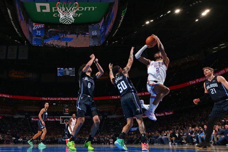 OKLAHOMA CITY, OK - JANUARY 13: Shai Gilgeous-Alexander #2 of the Oklahoma City Thunder shoots the ball during the game against the Orlando Magic on January 13, 2024 at Paycom Arena in Oklahoma City, Oklahoma. NOTE TO USER: User expressly acknowledges and agrees that, by downloading and or using this photograph, User is consenting to the terms and conditions of the Getty Images License Agreement. Mandatory Copyright Notice: Copyright 2024 NBAE (Photo by Zach Beeker/NBAE via Getty Images)