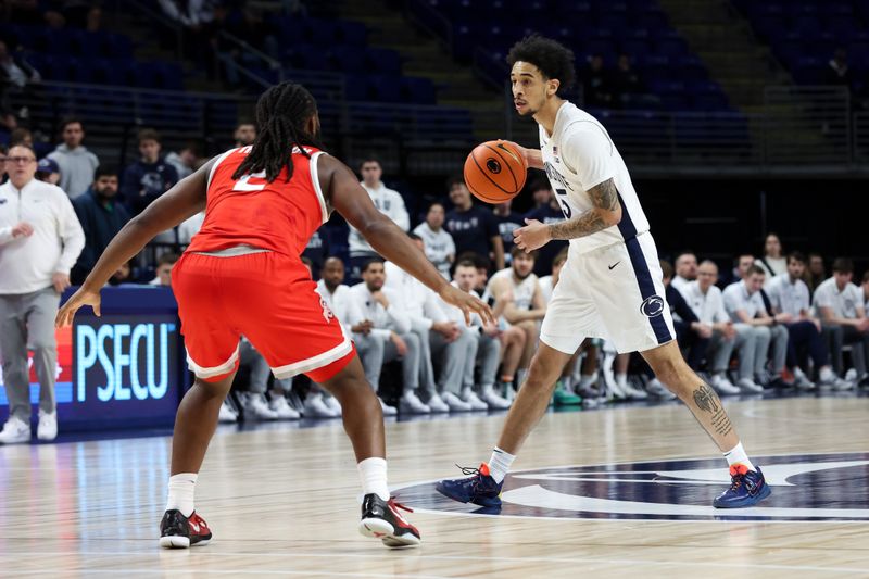 Mar 4, 2026; University Park, Pennsylvania, USA; Penn State Nittany Lions guard Freddie Dilione V (5) dribbles the ball as Ohio State Buckeyes guard Bruce Thornton (2) defends during the first half at Bryce Jordan Center. Mandatory Credit: Matthew O'Haren-Imagn Images