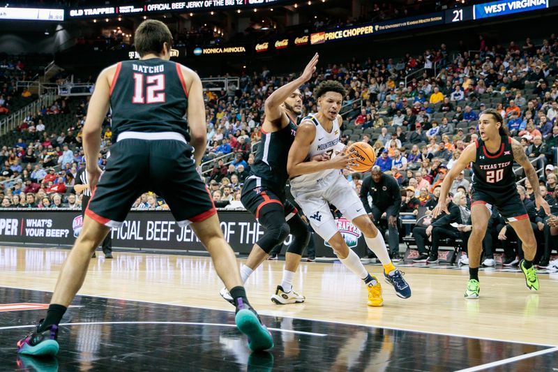 Mar 8, 2023; Kansas City, MO, USA; West Virginia Mountaineers forward Tre Mitchell (3) drives to the basket during the first half against the Texas Tech Red Raiders at T-Mobile Center. Mandatory Credit: William Purnell-USA TODAY Sports