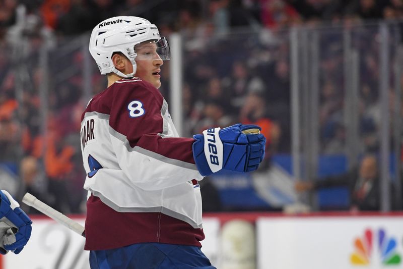 Nov 18, 2024; Philadelphia, Pennsylvania, USA; Colorado Avalanche defenseman Cale Makar (8) reacts after scoring his second goal of the game against the Philadelphia Flyers during the second period at Wells Fargo Center. Mandatory Credit: Eric Hartline-Imagn Images