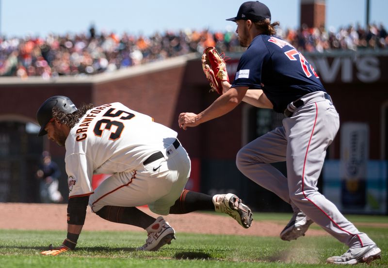 Jul 30, 2023; San Francisco, California, USA; Boston Red Sox pitcher Chris Murphy (72) tags out San Francisco Giants shortstop Brandon Crawford (35) in a rundown between third and home during the fifth inning at Oracle Park. Mandatory Credit: D. Ross Cameron-USA TODAY Sports