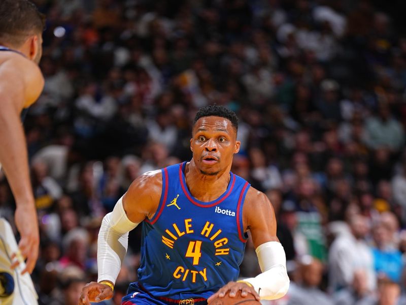 DENVER, CO - NOVEMBER 22: Russell Westbrook #4 of the Denver Nuggets dribbles the ball during the game against the Dallas Mavericks during the Emirates NBA Cup game on November 22, 2024 at Ball Arena in Denver, Colorado. NOTE TO USER: User expressly acknowledges and agrees that, by downloading and/or using this Photograph, user is consenting to the terms and conditions of the Getty Images License Agreement. Mandatory Copyright Notice: Copyright 2024 NBAE (Photo by Garrett Ellwood/NBAE via Getty Images)