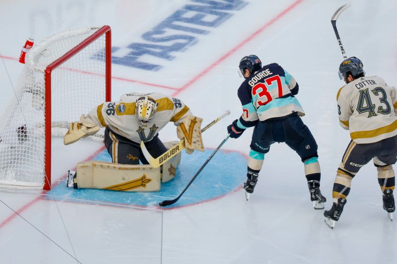 Jan 1, 2024; Seattle, Washington, USA; Seattle Kraken center Yanni Gourde (37) scores a goal against Vegas Golden Knights goaltender Logan Thompson (36) during the third period in the 2024 Winter Classic ice hockey game at T-Mobile Park. Mandatory Credit: Joe Nicholson-USA TODAY Sports