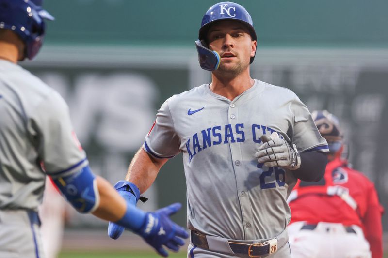 Jul 12, 2024; Boston, Massachusetts, USA; Kansas City Royals designated hitter Adam Frazier (26) scores during the first inning against the Boston Red Sox at Fenway Park. Mandatory Credit: Paul Rutherford-USA TODAY Sports