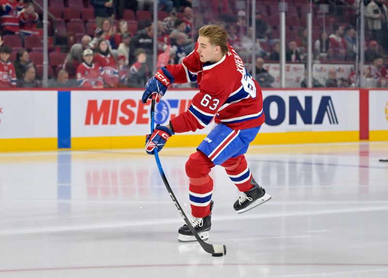 Nov 22, 2025; Montreal, Quebec, CAN; Montreal Canadiens forward Florian Xhekaj (63) skates a rookie lap during the warmup before the game against the Toronto Maple Leafs at the Bell Centre. Mandatory Credit: Eric Bolte-Imagn Images