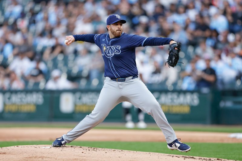 Apr 27, 2024; Chicago, Illinois, USA; Tampa Bay Rays starting pitcher Aaron Civale (34) delivers a pitch against the Chicago White Sox during the first inning at Guaranteed Rate Field. Mandatory Credit: Kamil Krzaczynski-USA TODAY Sports