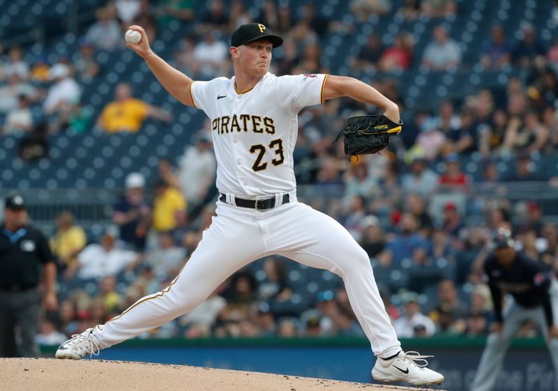 Jul 18, 2023; Pittsburgh, Pennsylvania, USA; Pittsburgh Pirates starting pitcher Mitch Keller (23) delivers a pitch against the Cleveland Guardians during the first inning at PNC Park. Mandatory Credit: Charles LeClaire-USA TODAY Sports