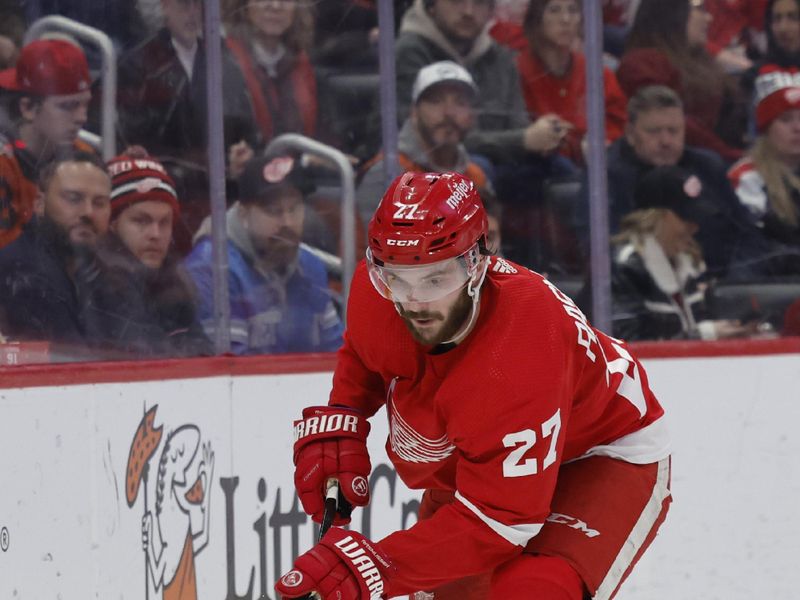 Jan 25, 2024; Detroit, Michigan, USA;  Detroit Red Wings center Michael Rasmussen (27) skates with the puck in the second period against the Philadelphia Flyers at Little Caesars Arena. Mandatory Credit: Rick Osentoski-USA TODAY Sports