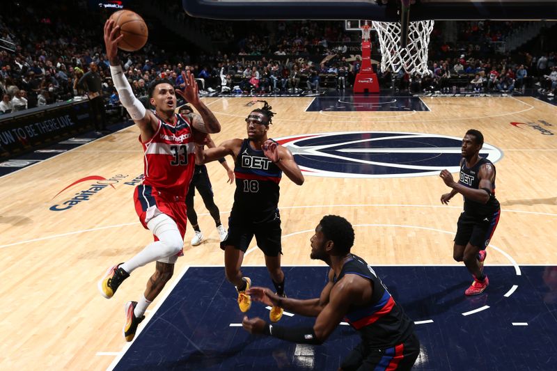 WASHINGTON, DC -? MARCH 29: Kyle Kuzma #33 of the Washington Wizards drives to the basket during the game against the Detroit Pistons on March 29, 2024 at Capital One Arena in Washington, DC. NOTE TO USER: User expressly acknowledges and agrees that, by downloading and or using this Photograph, user is consenting to the terms and conditions of the Getty Images License Agreement. Mandatory Copyright Notice: Copyright 2024 NBAE (Photo by Kenny Giarla/NBAE via Getty Images)