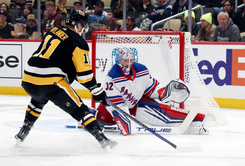 Nov 22, 2023; Pittsburgh, Pennsylvania, USA; New York Rangers goaltender Jonathan Quick (32) defends the net against Pittsburgh Penguins left wing Alex Nylander (11) during the first period at PPG Paints Arena. Mandatory Credit: Charles LeClaire-USA TODAY Sports