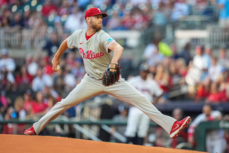 Aug 20, 2024; Cumberland, Georgia, USA; Philadelphia Phillies starting pitcher Zack Wheeler (45) pitches against the Atlanta Braves during the first inning at Truist Park. Mandatory Credit: Dale Zanine-USA TODAY Sports