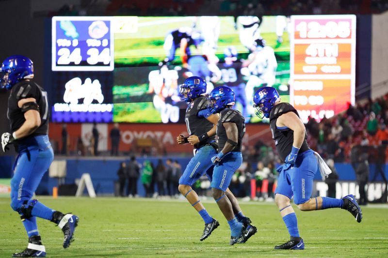 Dec 17, 2022; Frisco, Texas, USA;  Boise State Broncos quarterback Taylen Green (10) and running back Ashton Jeanty (2) celebrate after a touchdown against the North Texas Mean Green in the second half at Toyota Stadium. Mandatory Credit: Tim Heitman-USA TODAY Sports