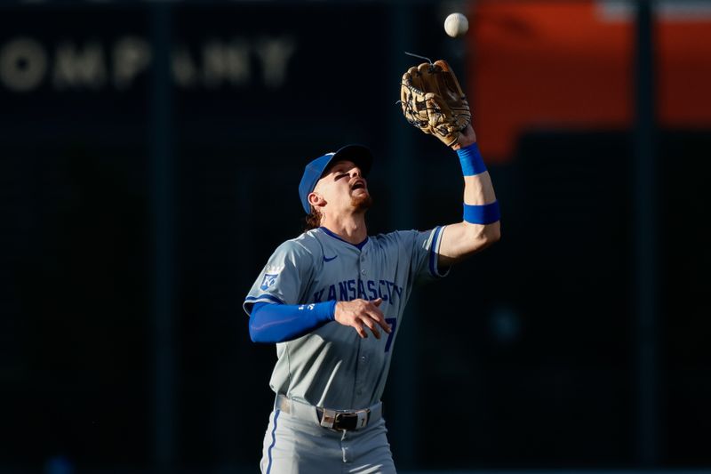 Jul 6, 2024; Denver, Colorado, USA; Kansas City Royals shortstop Bobby Witt Jr. (7) makes a catch in the second inning against the Colorado Rockies at Coors Field. Mandatory Credit: Isaiah J. Downing-USA TODAY Sports