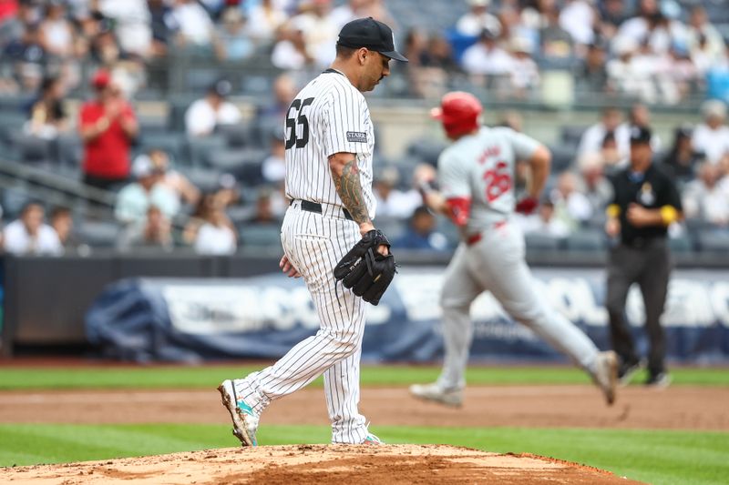 Sep 1, 2024; Bronx, New York, USA;  New York Yankees starting pitcher Nestor Cortes (65) reacts after giving up a two run home run to St. Louis Cardinals designated hitter Luken Baker (26) in the fourth inning at Yankee Stadium. Mandatory Credit: Wendell Cruz-USA TODAY Sports